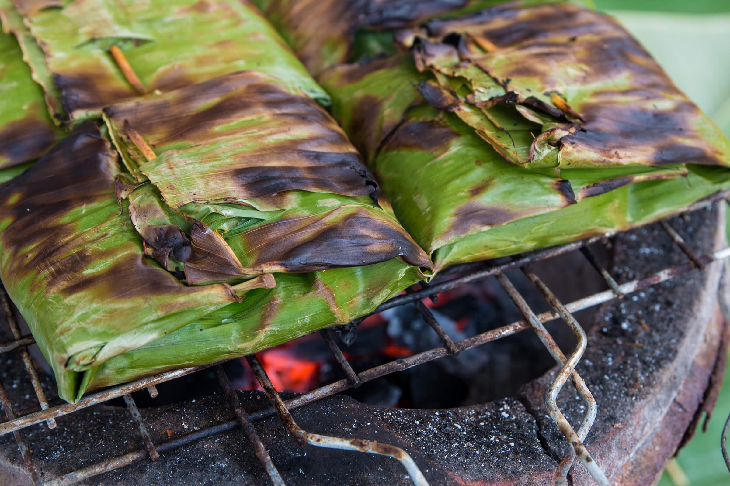 Grilled Fish in Banana Leaves at Com Com Restaurant