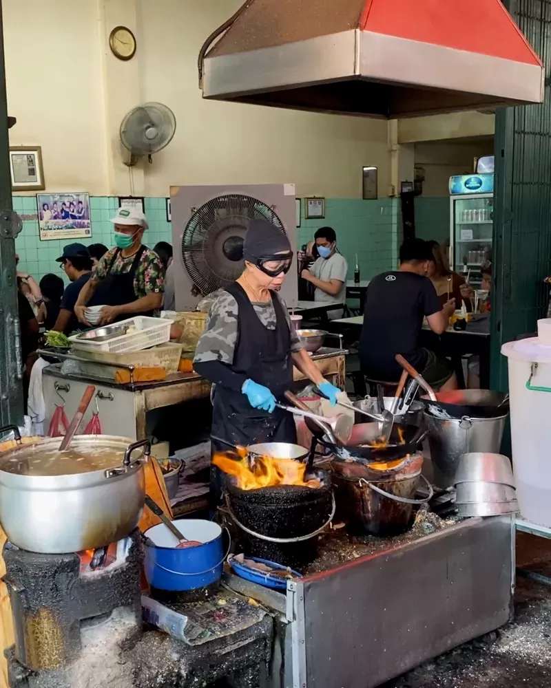 Vibrant street food vendors in Vietnam selling fresh and delicious dishes.