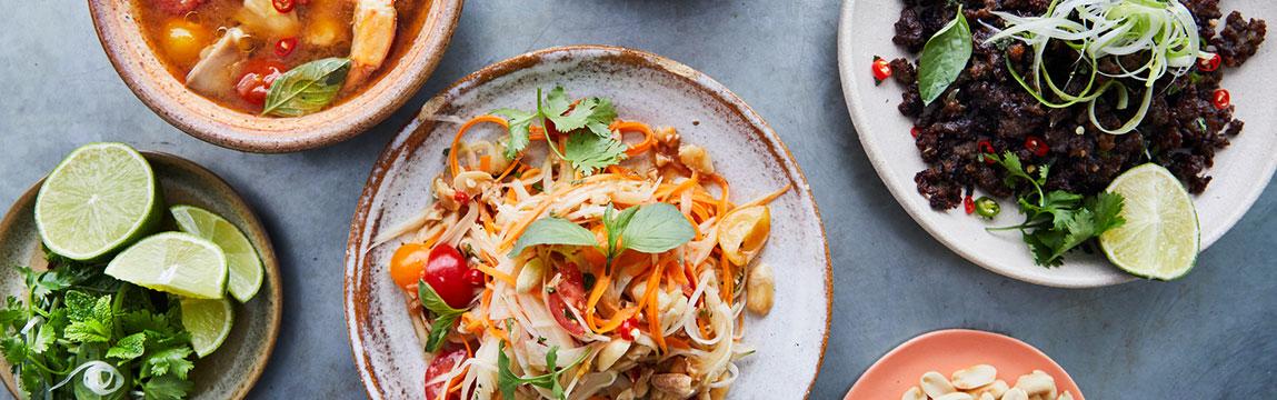 Vibrant Vietnamese Street Food Vendors Preparing Delicious Dishes