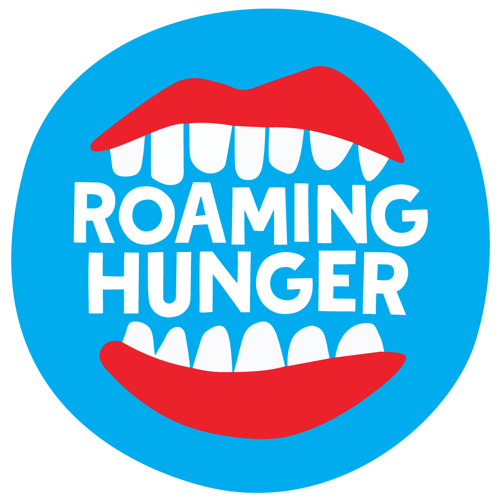 Vietnamese Street Food Vendor Preparing Banh Mi