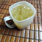 Vietnamese street food vendor preparing pho in Hanoi